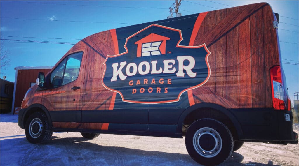 sprinter van full wrap with kooler logo and wood grain