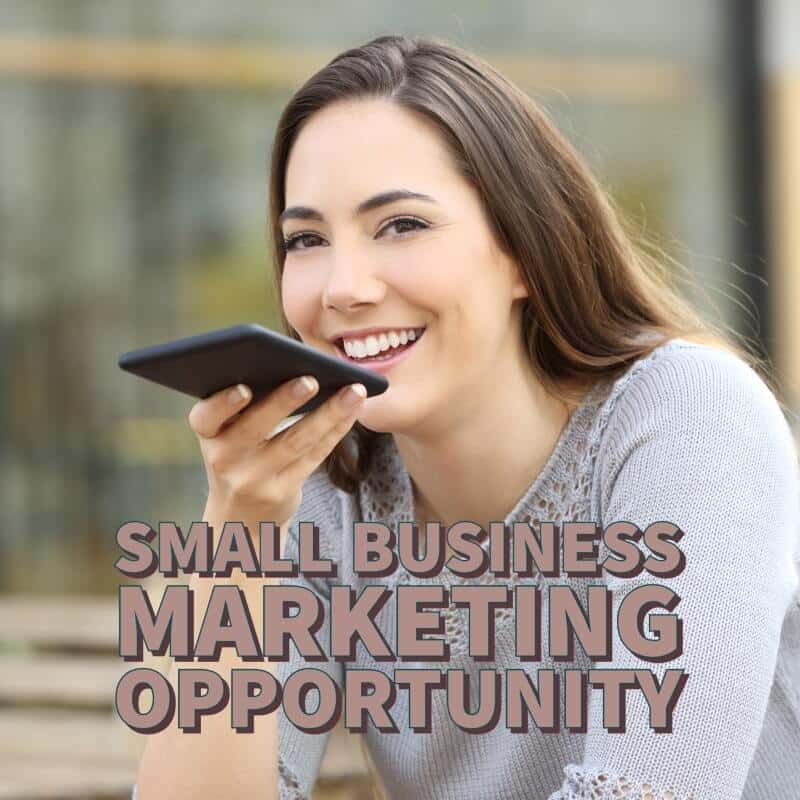 small business marketing opportunity would be voice search marketing. woman holding phone asking voice search while smiling